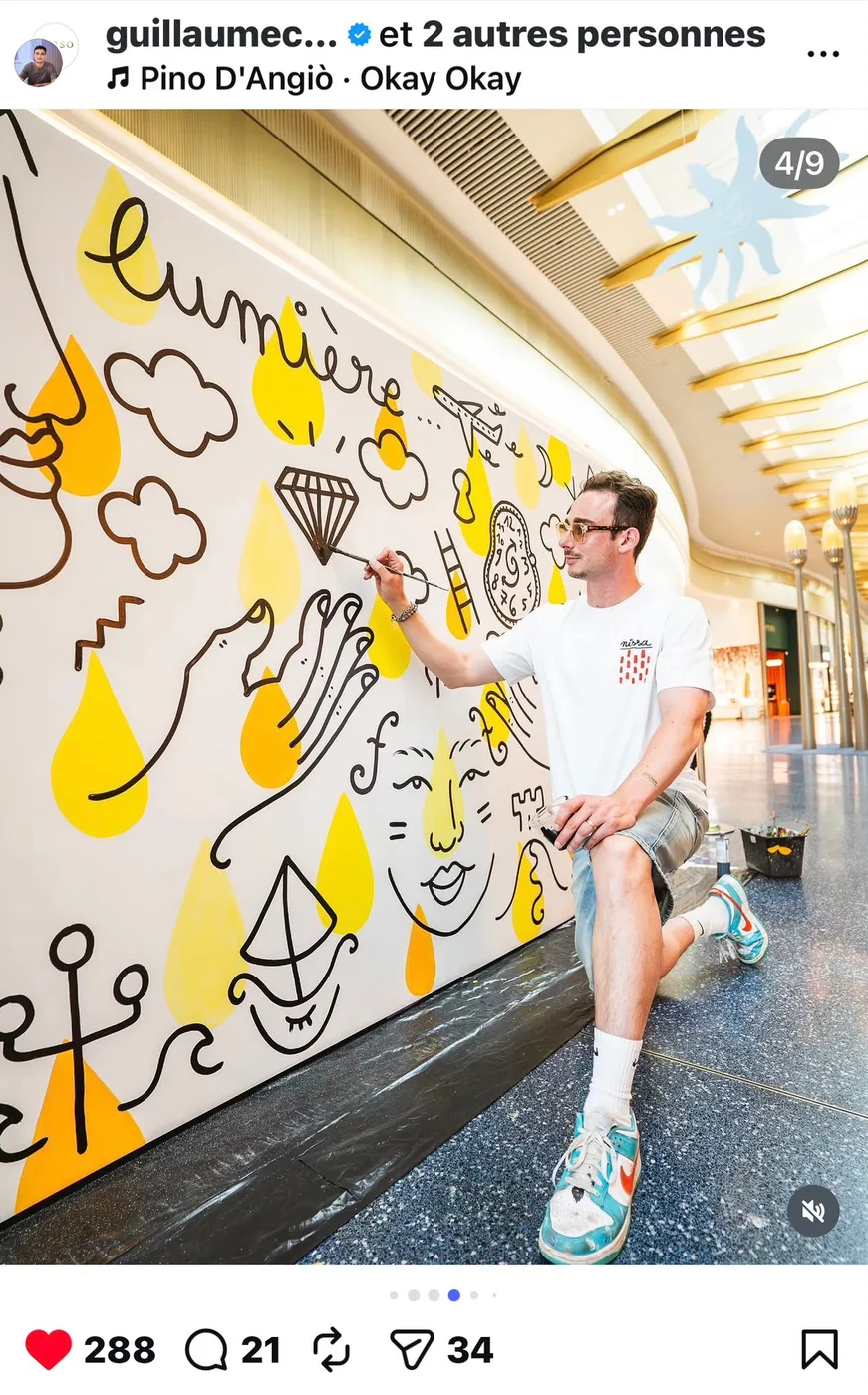 Guillaume Cavalier devant l'une de ses fresques à Cap3000 — Art'cade Design Signature